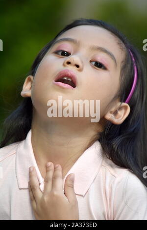 A Juvenile With Sore Throat Stock Photo