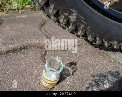 Bicycle tire plates through glass Stock Photo