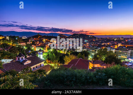 Plovdiv city, Bulgaria. Panoramic photo over the city after sunset. Stock Photo