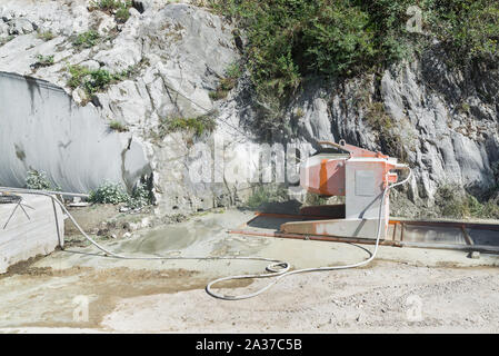 Marble cutting machine. Machine during the cutting phase in a quarry. Stone processing Stock Photo