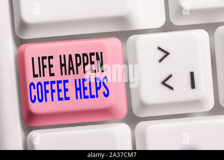 Writing note showing Life Happen Coffee Helps. Business concept for Have a hot drink when having problems troubles Keyboard with note paper on white b Stock Photo