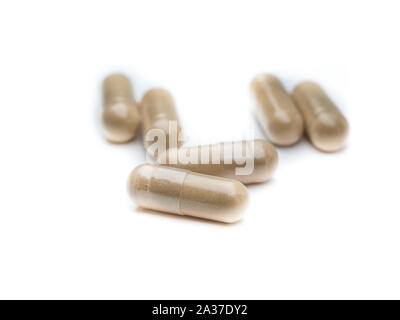 Healing earth capsules isolated Stock Photo