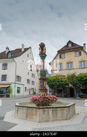 Delemont, Jura / Switzerland - 28 August, 2019:  view of the historic 'Fontaine du Lion' or Lion Fountain in the Swiss city of Delemont Stock Photo