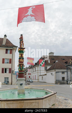 Delemont, Jura / Switzerland - 28 August, 2019: view of the historic 'Fountain du Sauvage' or Fountain of the Savage in the Swiss city of Delemont Stock Photo