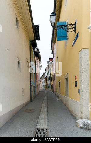 Delemont, Jura / Switzerland - 28 August, 2019: narrow empty street in the historic old town of Delemont in northwestern Switzerland Stock Photo