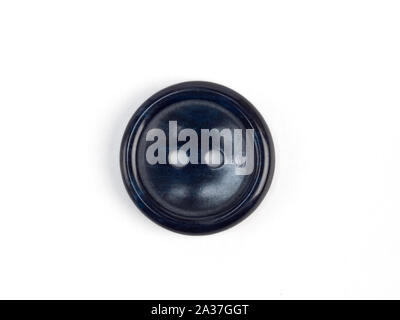 Dark blue plastic button on white background Stock Photo