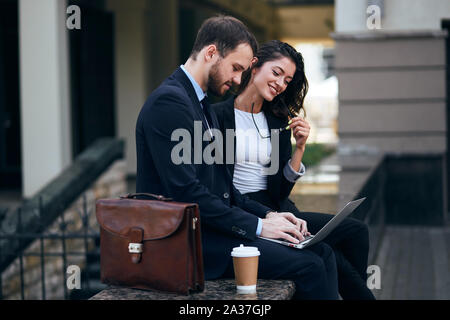 happy young employees are going to strat business, close up side view photo. young ambitious people looking for bargain Stock Photo