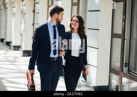 two pleasant happy colleagues having a rest after working day, close up photo. love, friendship Stock Photo