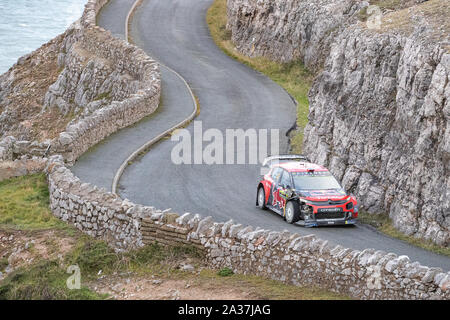 Llandudno, Wales, UK. 6th Oct 2019. Great Orme stage has been called off because rough weather conditions mean the team of divers required for safety reasons cannot get close enough to the stage, The cars drove a parade lap  Credit: Jason Richardson/Alamy Live News Stock Photo