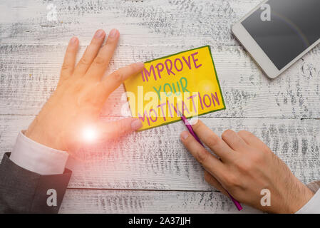 Writing note showing Improve Your Motivation. Business concept for Boost your self drive Enhance Motives and Goals Stock Photo