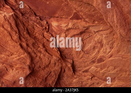 Colorful sandstone walls eroded by time and water to create smooth layers in Rozhdestveno. Stock Photo