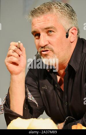 Television celebrity baker Paul Hollywood demonstrating his baking