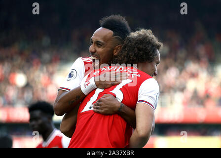 Arsenal's David Luiz (right) celebrates scoring his sides first goal of the game with Pierre-Emerick Aubameyang during the Premier League match at the Emirates Stadium, London. Stock Photo