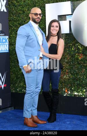 Ricochet, Kacy Catanzaro at arrivals for WWE 20th Anniversary Celebration SmackDown Premiere, STAPLES Center, Los Angeles, CA October 4, 2019. Photo By: Priscilla Grant/Everett Collection Stock Photo