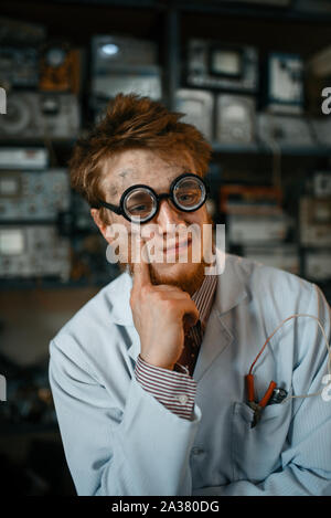 Portrait of strange male scientist in glasses Stock Photo