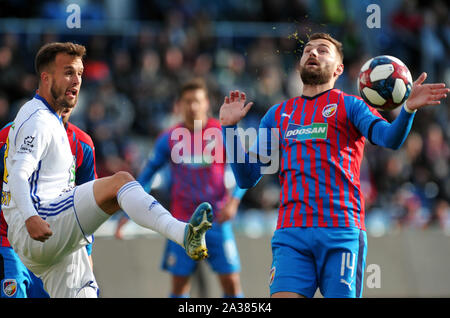 Mlada Boleslav, Czech Republic. 6th Oct, 2019. Lukas Budinsky (L) of Mlada Boleslav fight for ball with Radim Reznik of Viktoria Plzen (R) during the 12th round match of Czech soccer league Mlada Boleslav v Viktoria Plzen in Mlada Boleslav in the Czech Republic. Credit: Slavek Ruta/ZUMA Wire/Alamy Live News Stock Photo