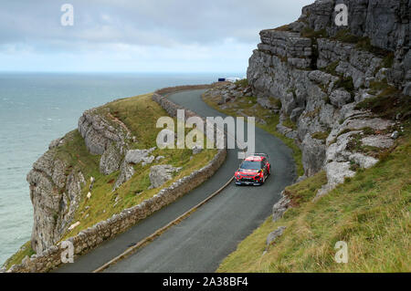 Freance’s Sébastien Ogier and Julien Ingrassia in a Citroen C3 WRC during day four of the Wales Rally GB. Stock Photo