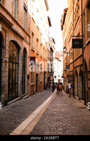 Shops and restaurants on the famous Rue du Boeuf, a cobblestone pedestrian street in the Vieux Lyon quarter of Lyon, France. Stock Photo