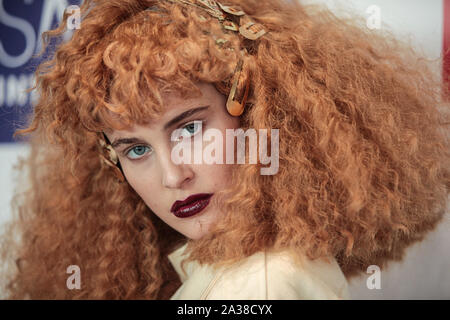 London, UK. 06th Oct, 2019. Wella Professional with their colourful and full hairs at the Salon International 2019 held at London Excel. Credit: Paul Quezada-Neiman/Alamy Live News  Stock Photo