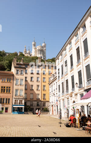 Looking up toward the Basilica Notre-Dame de Fourviere from Place Saint-Jean in Lyon, France. Stock Photo