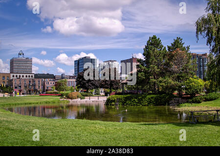 Barrie, Ontario, Canada - 2019 08 25: Summer view on the pond in the Heritage Park in Downtown Barrie, Ontario, Canada Stock Photo