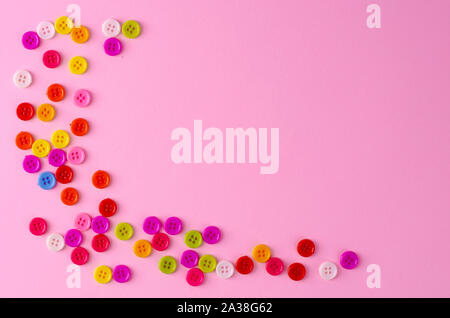 Many colorful buttons on blue background. Selective focus. Copy space Stock Photo