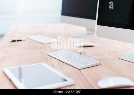 close up.digital tablet and personal computers on the office Desk Stock Photo