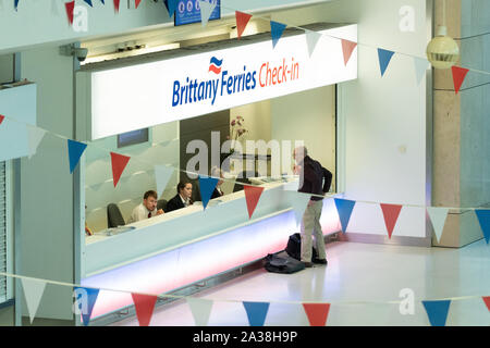 Brittany Ferries check in desk at Portsmouth Port, England,UK Stock Photo