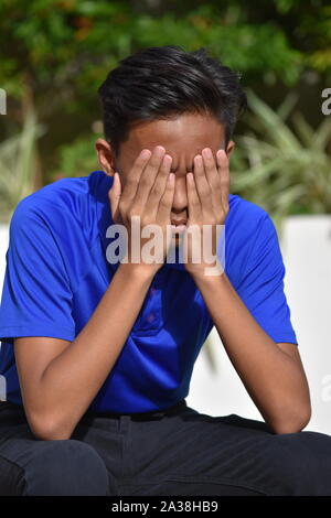 An A Disappointed Teenager Boy Stock Photo