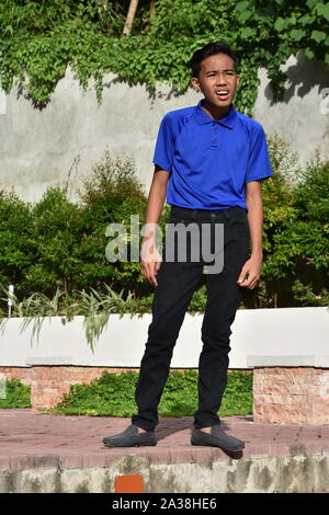 A Confused Young Filipino Teenage Male Stock Photo - Alamy