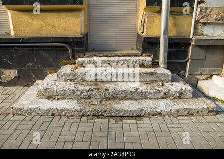 Old ruined concrete stairs before renovation works. Stock Photo