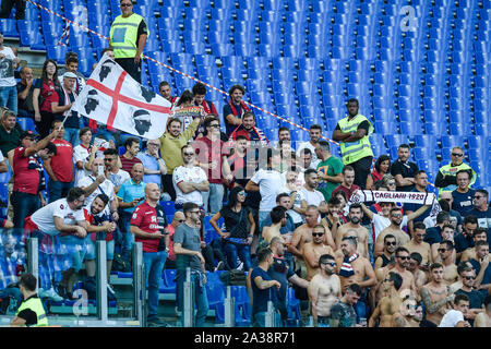 Roma, Italy. 06th Oct, 2019. Cagliari supporters during the Serie A match between Roma and Cagliari at Stadio Olimpico, Rome, Italy on 6 October 2019 Credit: Giuseppe Maffia/Alamy Live News Stock Photo