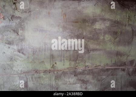 texture of cement. Texture cement colored. Background for the designer colored wall color gray green brown in daylight. Rectangular vertical texture o Stock Photo