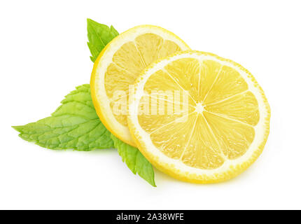 Isolated lemon and mint. Two pieces of lemon fruit and fresh mint leaves isolated on white background with clipping path Stock Photo