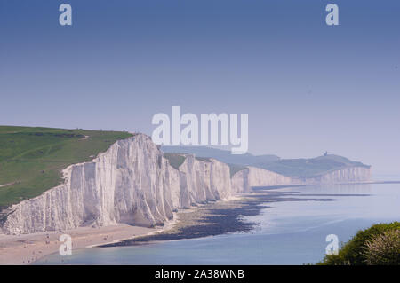 The Seven Sisters are a series of chalk cliffs by the English Channel. They form part of the South Downs in East Sussex. Stock Photo