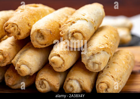 Small italian bread rolls crostini made from wheat dough with sesame close up Stock Photo