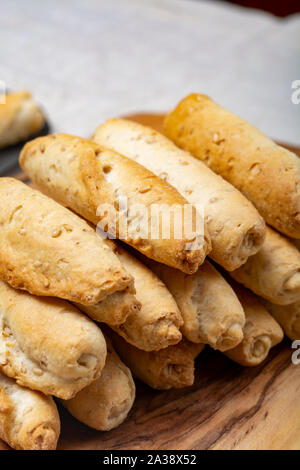 Small italian bread rolls crostini made from wheat dough with sesame close up Stock Photo