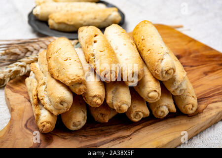 Small italian bread rolls crostini made from wheat dough with sesame close up Stock Photo