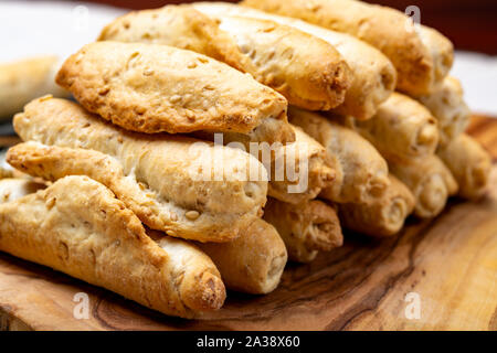 Small italian bread rolls crostini made from wheat dough with sesame close up Stock Photo
