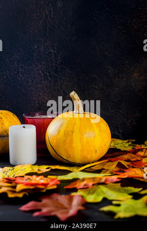 Halloween decorations,pumpkins, variety of gingerbreads,, spider and cobweb on black background, autumn holidays concept, harvesting, copy space, top Stock Photo