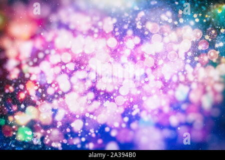 Abstract glitter lights and stars. Festive blue and white color sparkling vintage background . Blurred bokeh christmas background with snowflakes Stock Photo