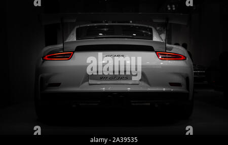 A picture of the rear view of the Porsche 911 GT3 RS, captured in an auto shop in Berlin. Stock Photo