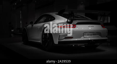 A picture of the rear view of the Porsche 911 GT3 RS, captured in an auto shop in Berlin. Stock Photo