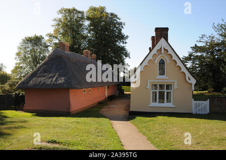 The Almshouses, Thaxted, Essex, stand in the churchyard providing a marvellous view to John Webb’s Windmill. Stock Photo