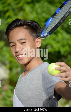 Happy Male Tennis Player With Tennis Racket Stock Photo