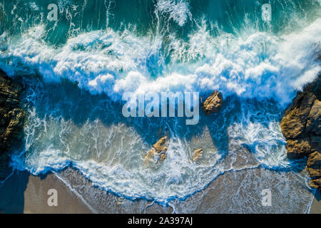 Aerial view of waves crashing on beach, Calvi, Corsica, France Stock Photo