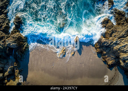 Aerial view of waves crashing on beach, Calvi, Corsica, France Stock Photo