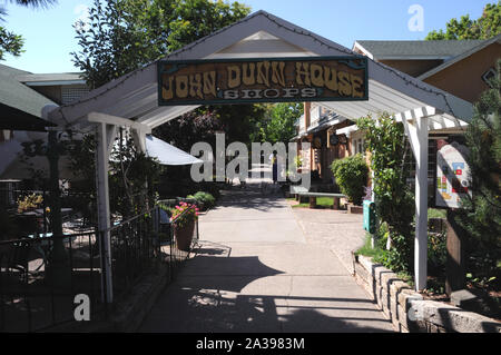 Entrance to the John Dunn shops near the historic plaza in Taos, New Mexico. The shops are named after Long John Dunn, local character and legend.. Stock Photo