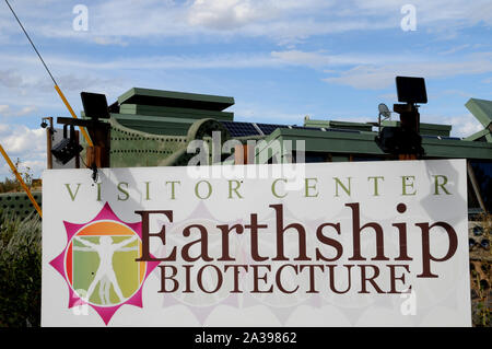 Sign directing visitors to the Earthship Biotecture complex on the outskirts of Taos New Mexico USA. Stock Photo