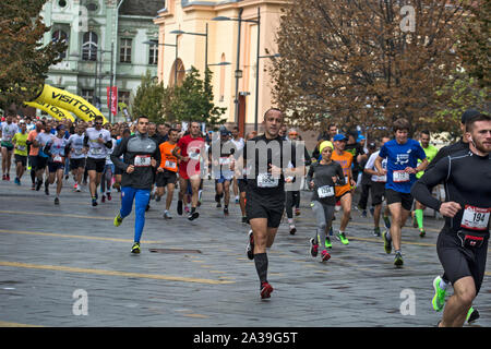 Zrenjanin, Serbia, October 06. 2019.A large group of competitors starts from the starting line at the 4 Zrenjanin Half Marathon streets of the city. Stock Photo